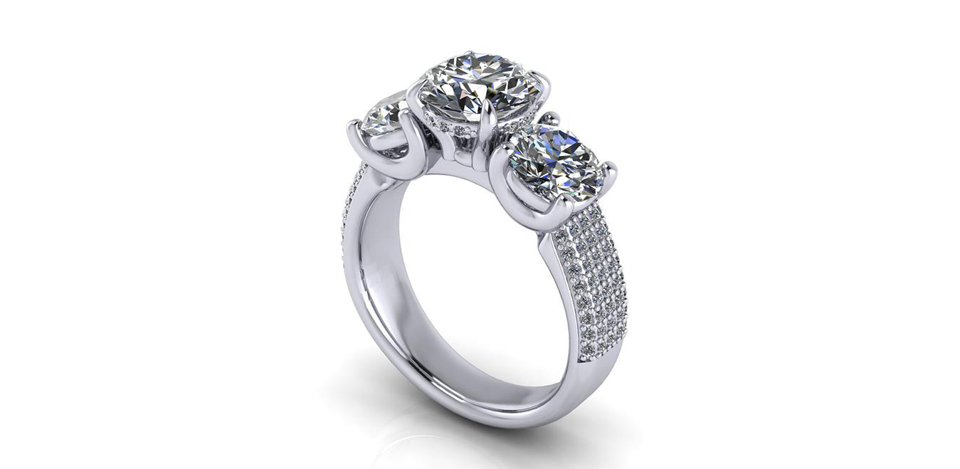A CAD render of a three-diamond ring in white metal, with pavé along the sweep of the band