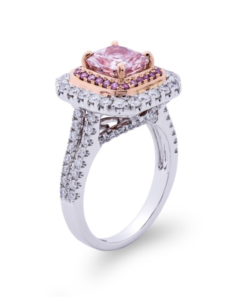 A cushion-cut orangy pink diamond ring in white and rose gold