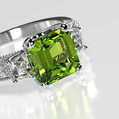 A square-cut peridot ring in white gold