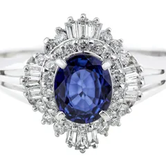 An oval sapphire ring in a ballerina halo of diamonds