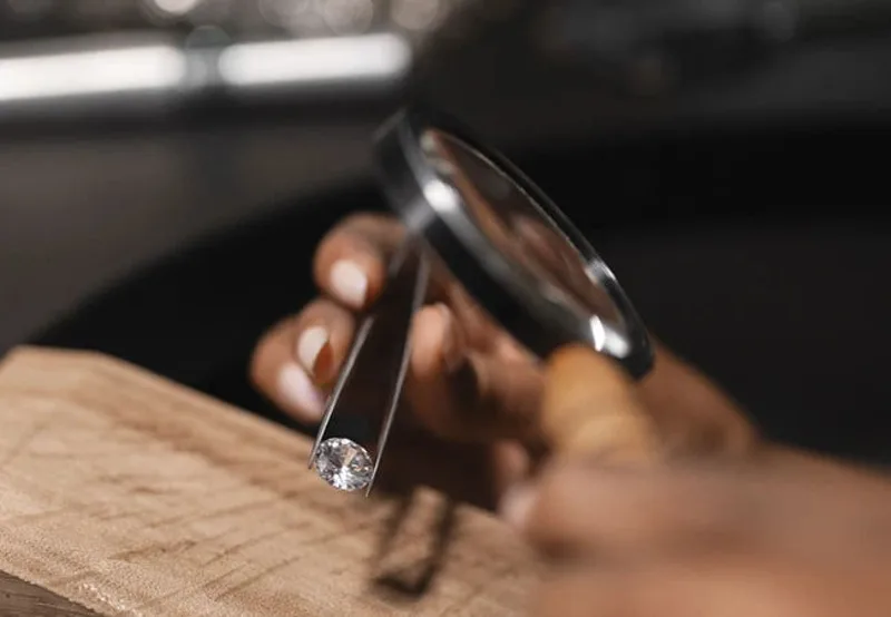 A diamond examined under the loupe